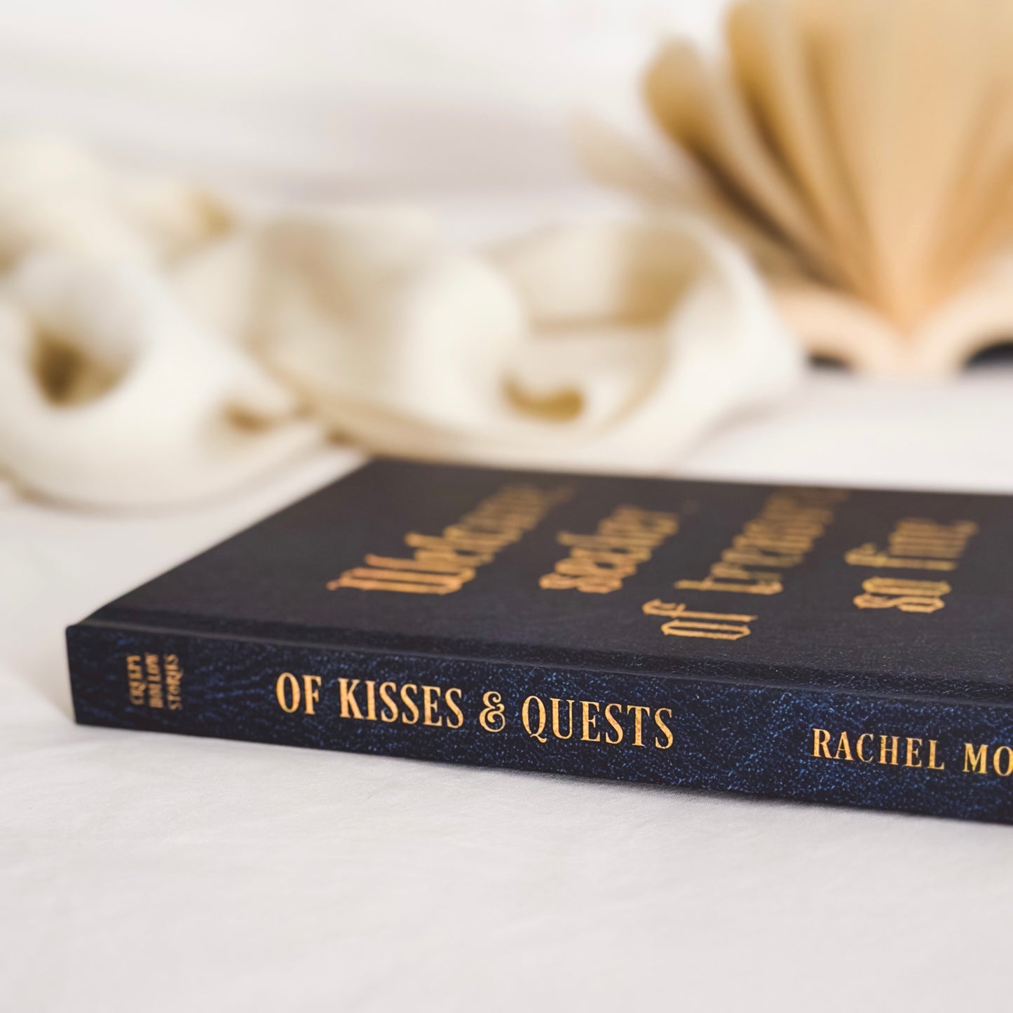 Of Kisses & Quests HARDBACK